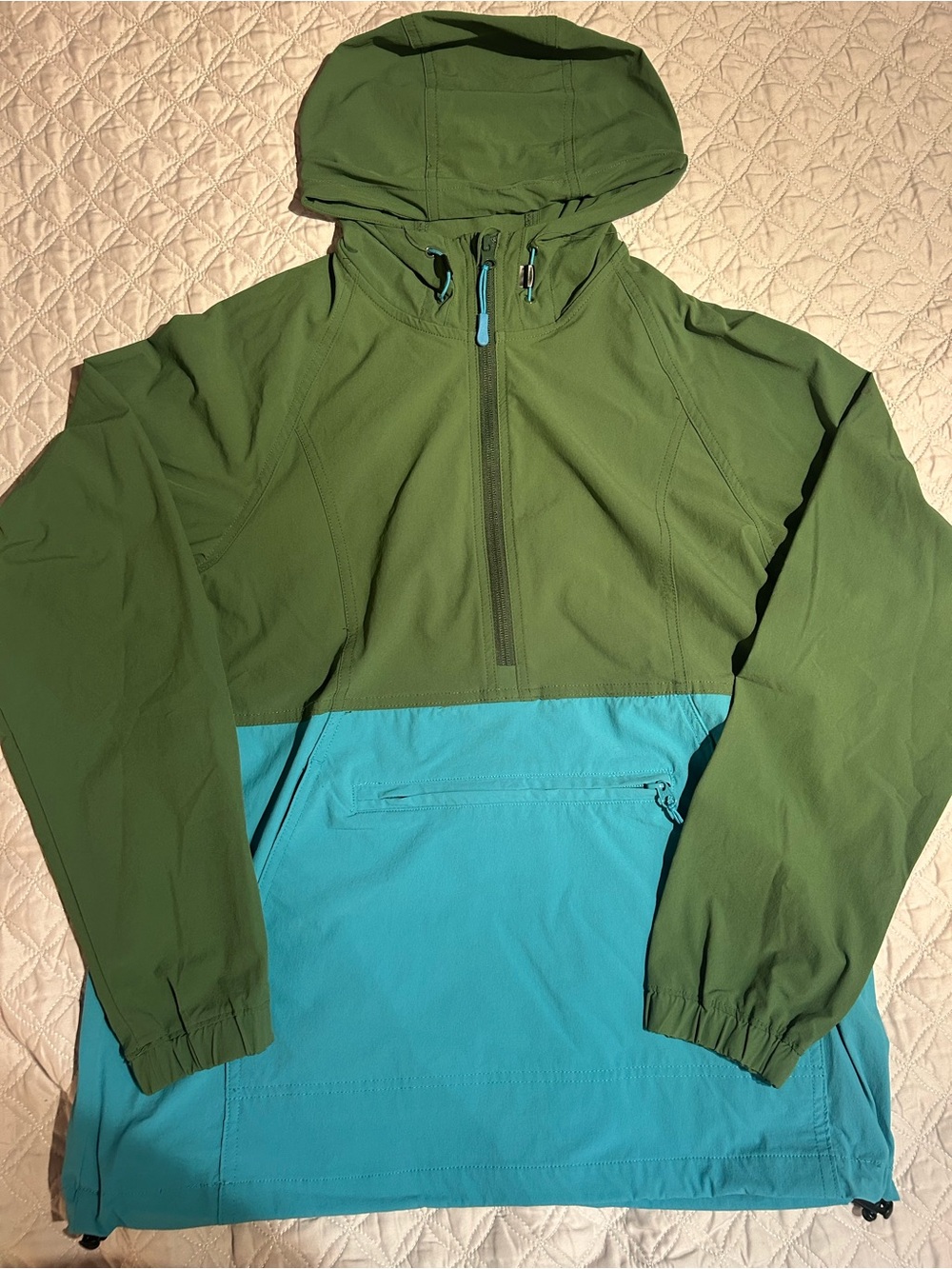 Ascend Women’s Olive Green and Teal packable Hooded Windbreaker